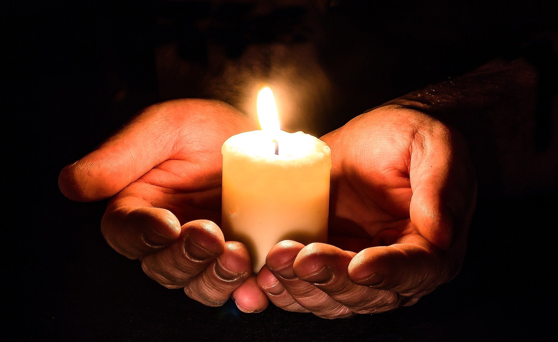 Hands with Candle
